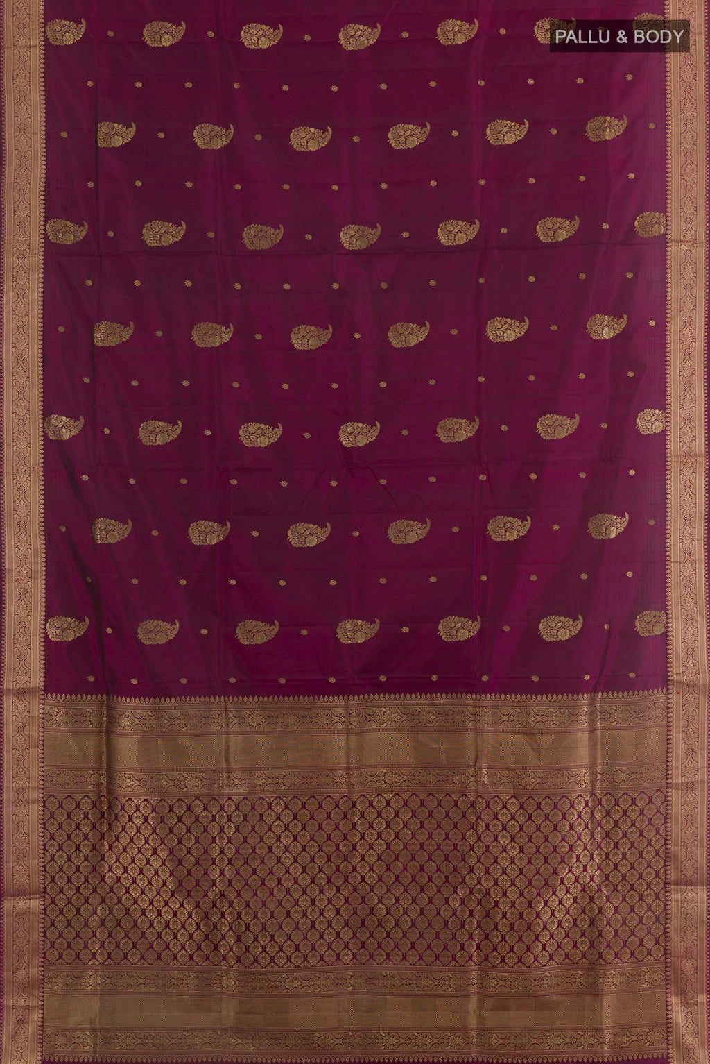 Flat view of Purple Soft Silk Saree with Zari Butta on the body and Zari Border. 
