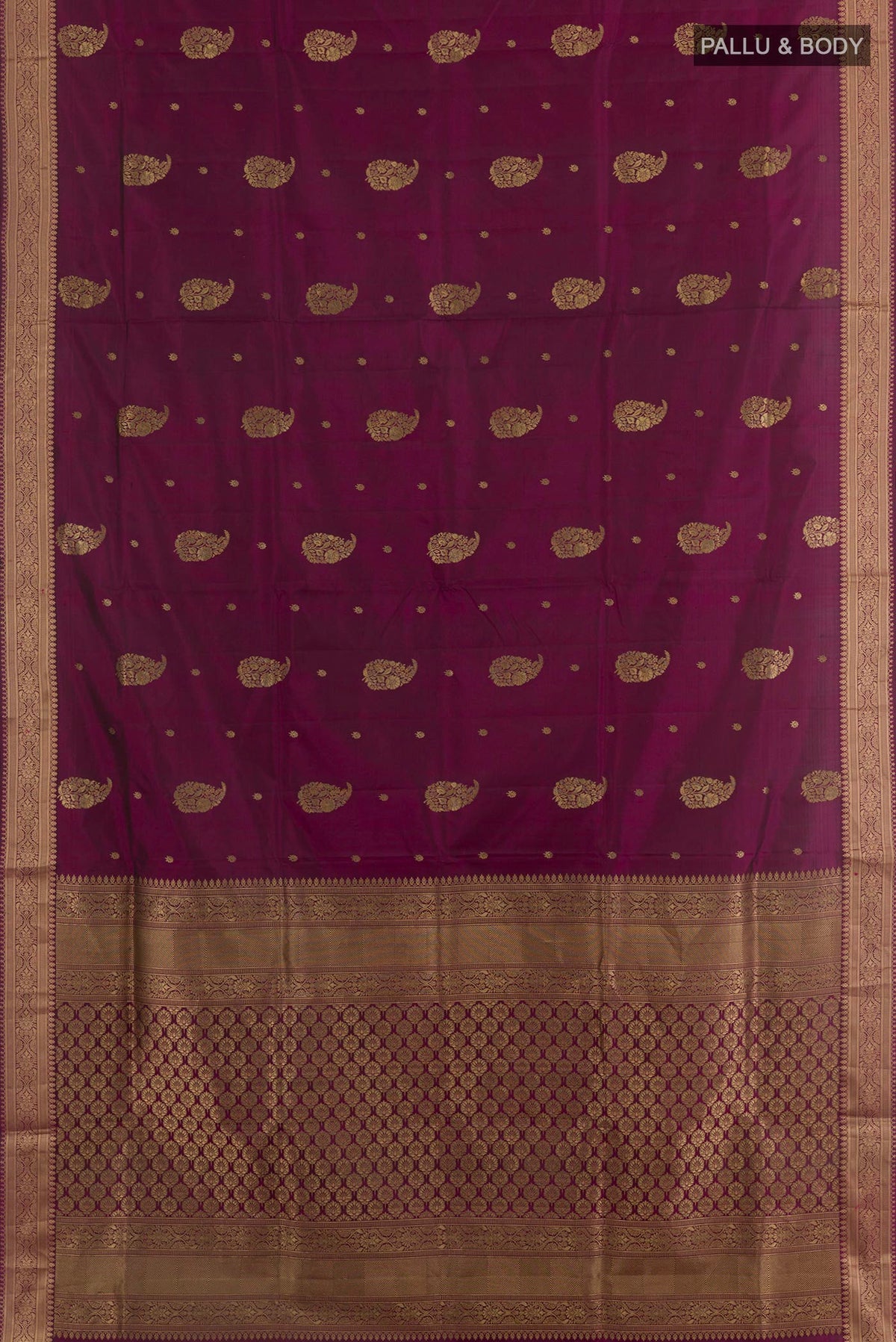 Flat view of Purple Soft Silk Saree with Zari Butta on the body and Zari Border. 