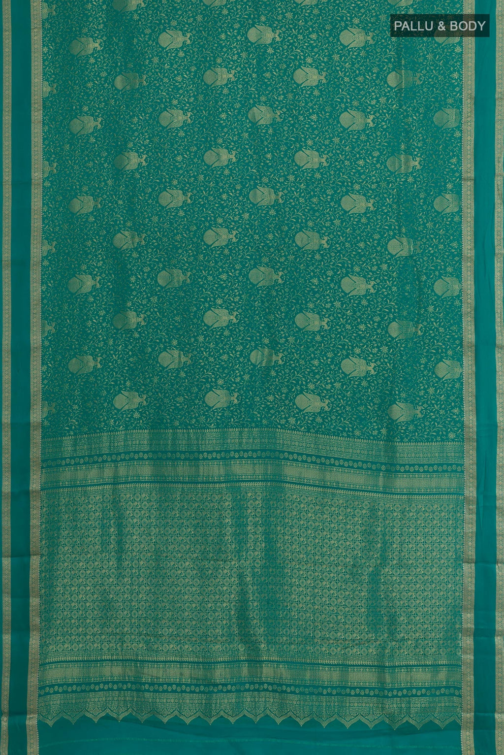 Flat view of Sea Green Mysore Crepe Saree with Zari Brocade on the body and Zari Border. 