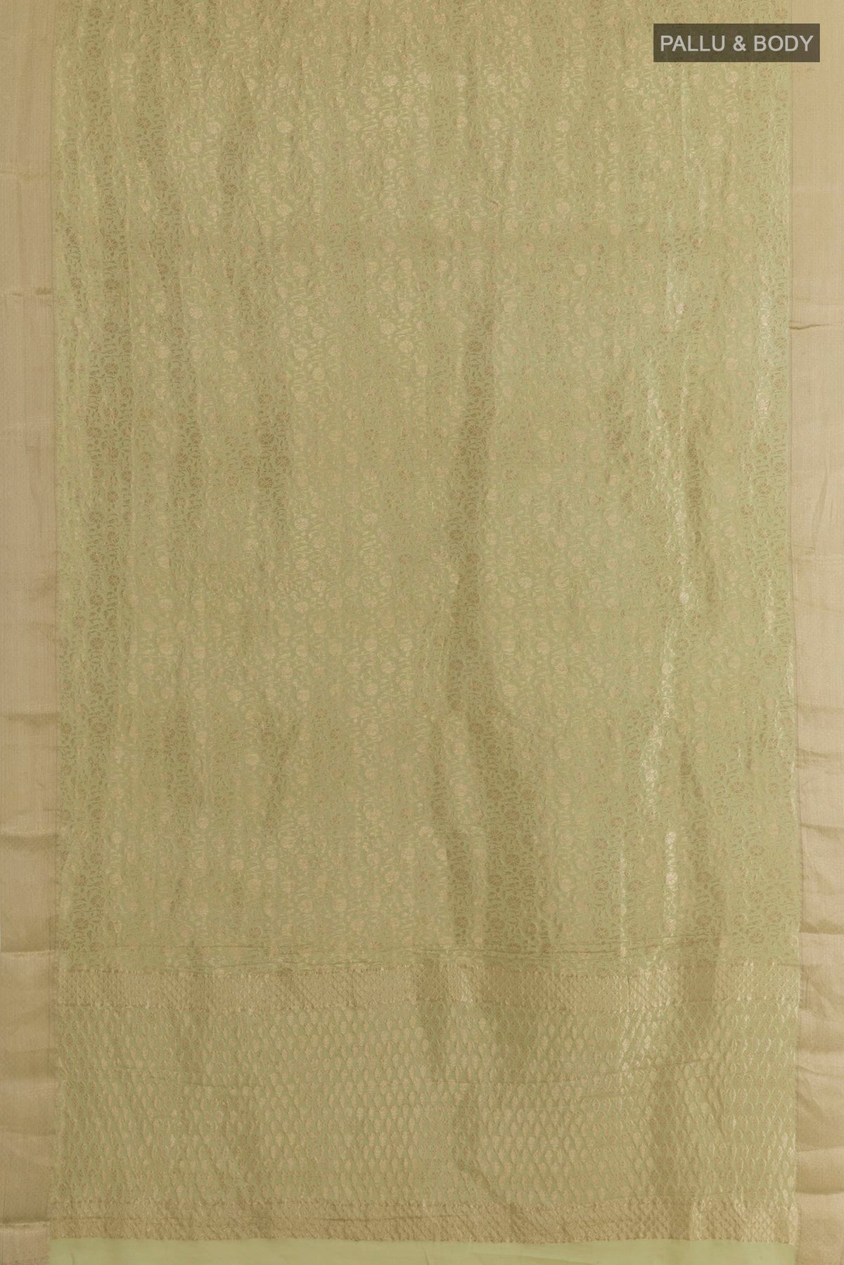 Flat view of Light Green Mysore Crepe Saree with Zari Brocade on the body and Zari Border. 