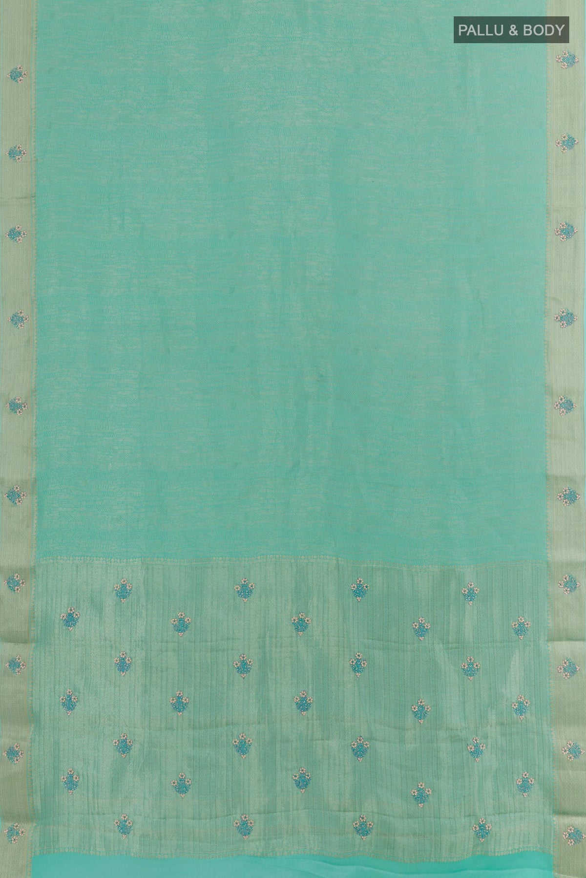 Flat view of Turquoise Mysore Crepe Saree with Zari Brocade on the body and Zari Border. 