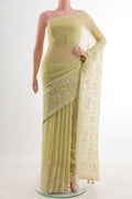 Lemon Yellow Mysore Georgette Saree with Embroidery on the body and Embroidery Border.  displayed on a mannequin