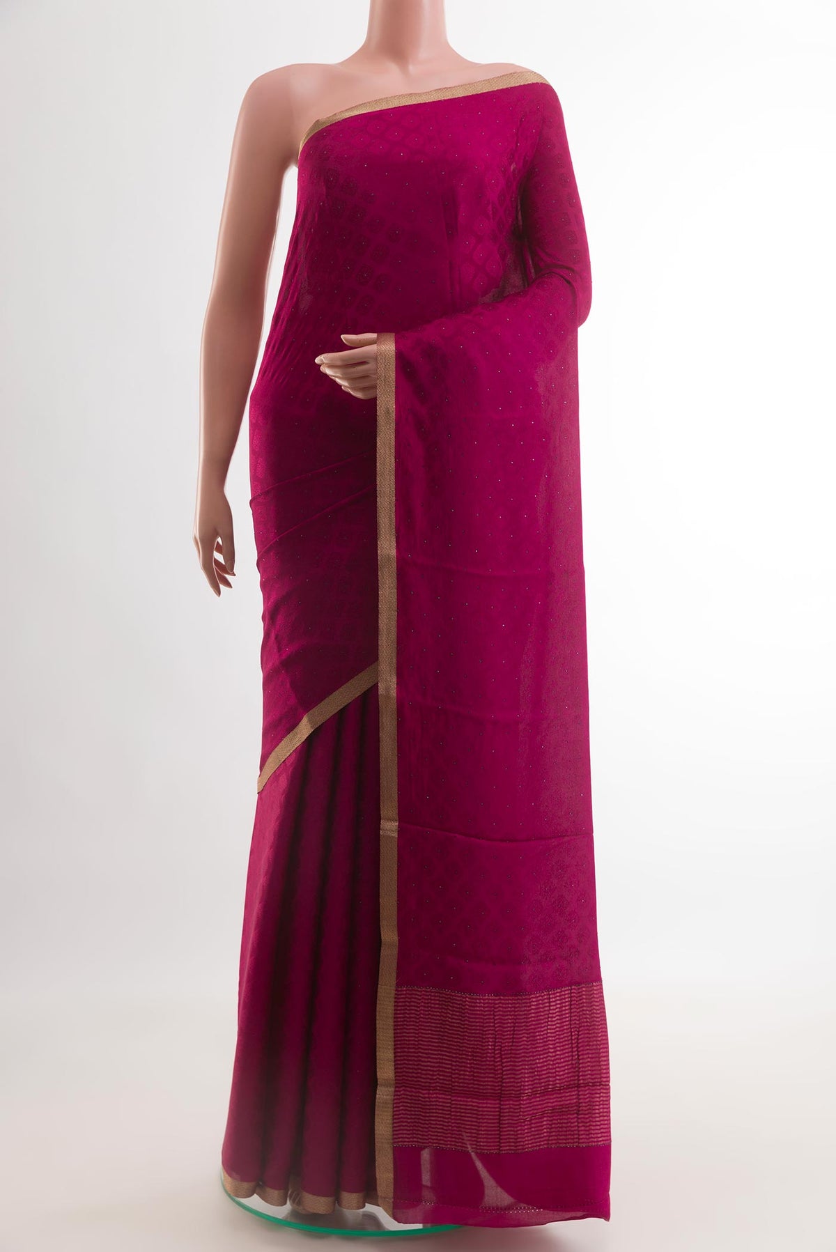 Dark Pink Mysore Crepe Saree with Jacquard design on the body and Zari Border.  displayed on a mannequin