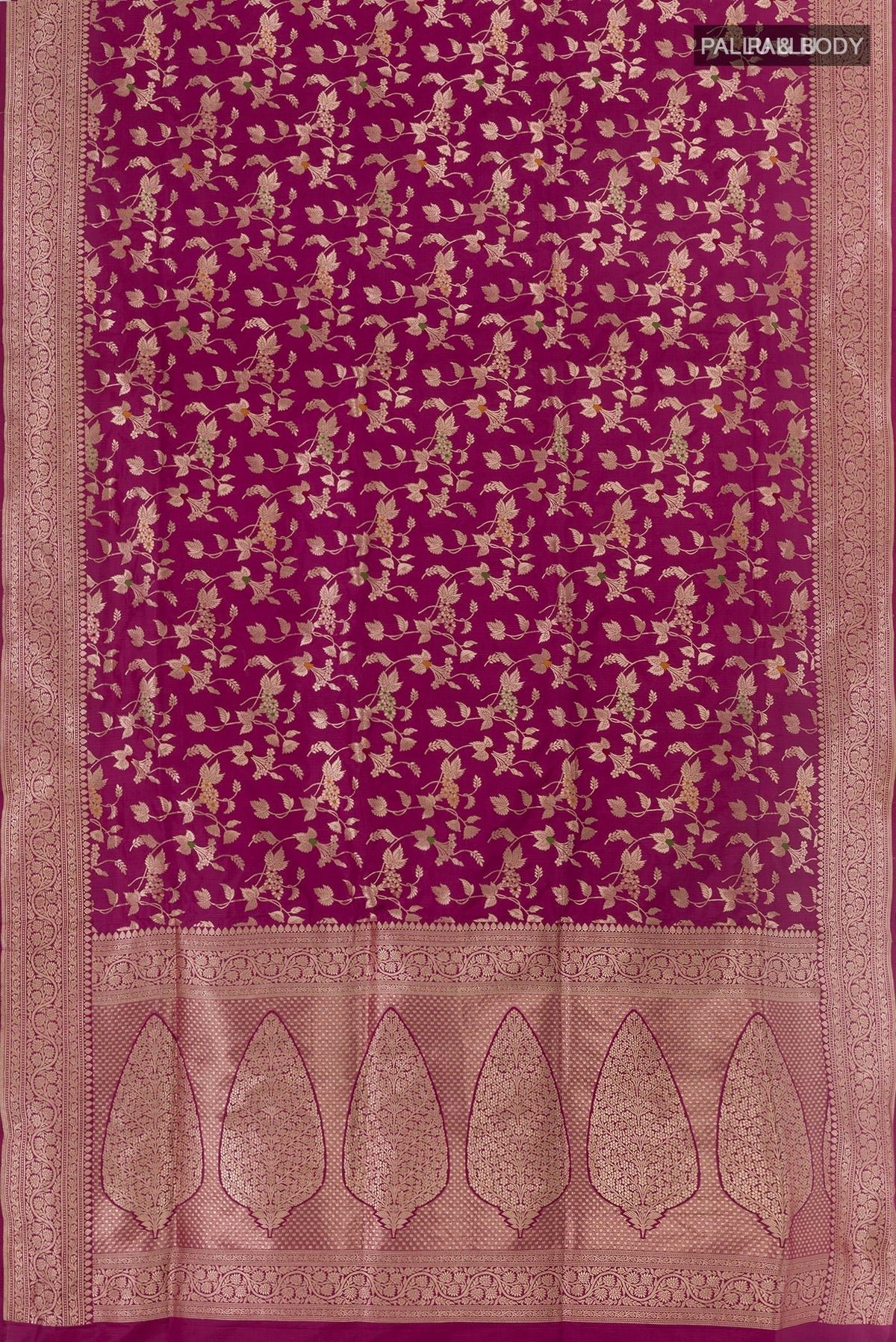 Flat view of Purple Banarasi Silk Saree with Zari Brocade on the body and Zari Border. 