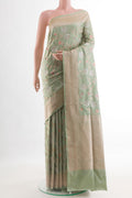 Sage Green Banarasi Silk Saree with Zari Brocade on the body and Zari Border.  displayed on a mannequin