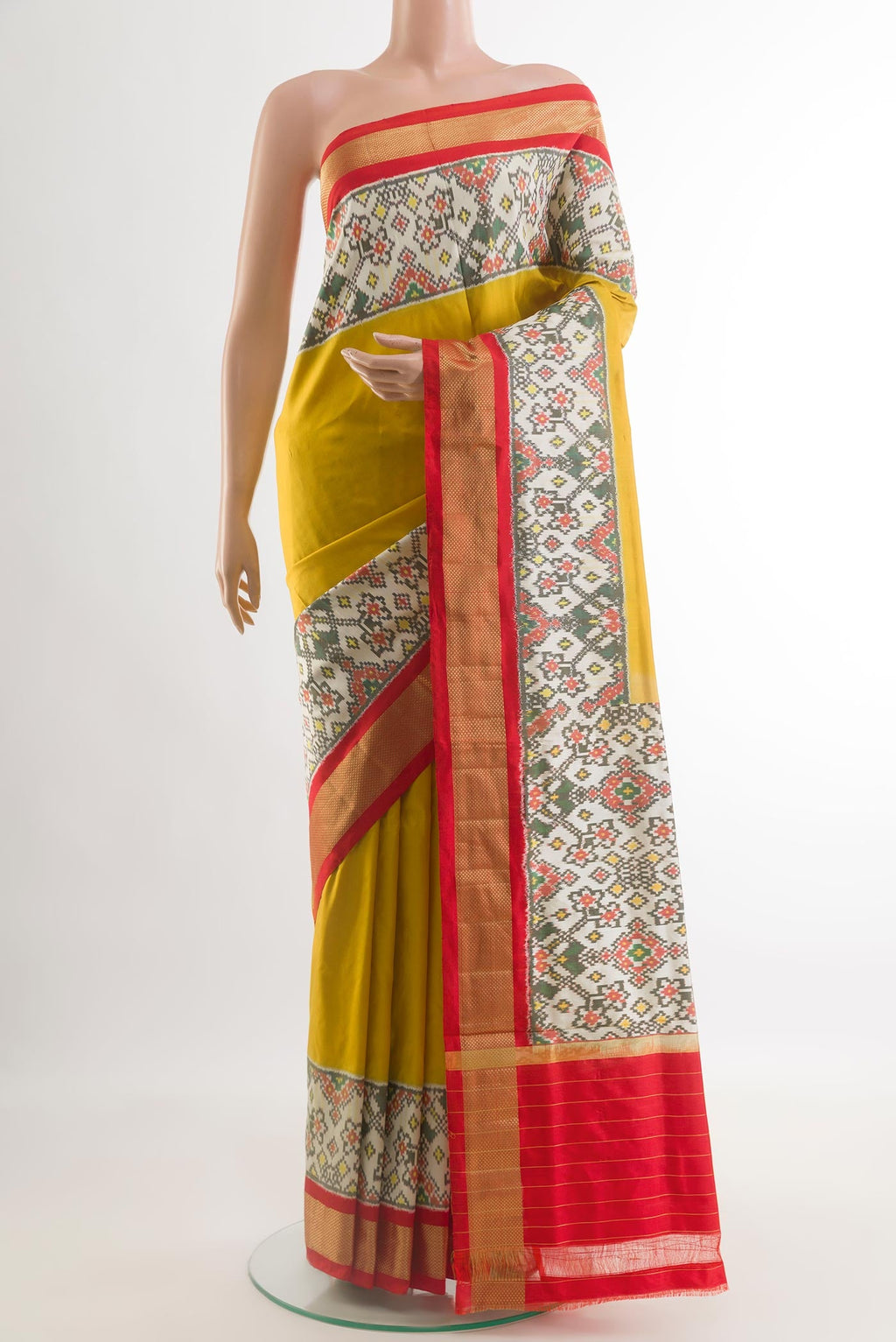 Yellow Pochampally Silk Saree with Plain Body and Ikat Border.  displayed on a mannequin