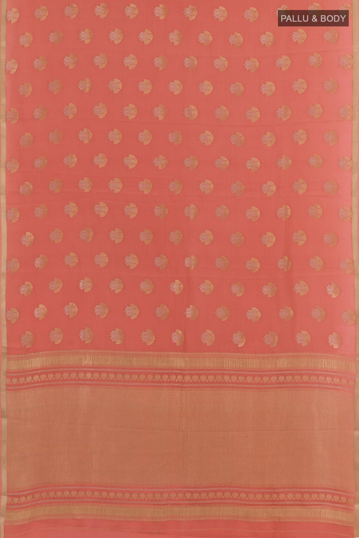 Flat view of Peach Mysore Crepe Saree with Zari Butta on the body and Zari Border. 