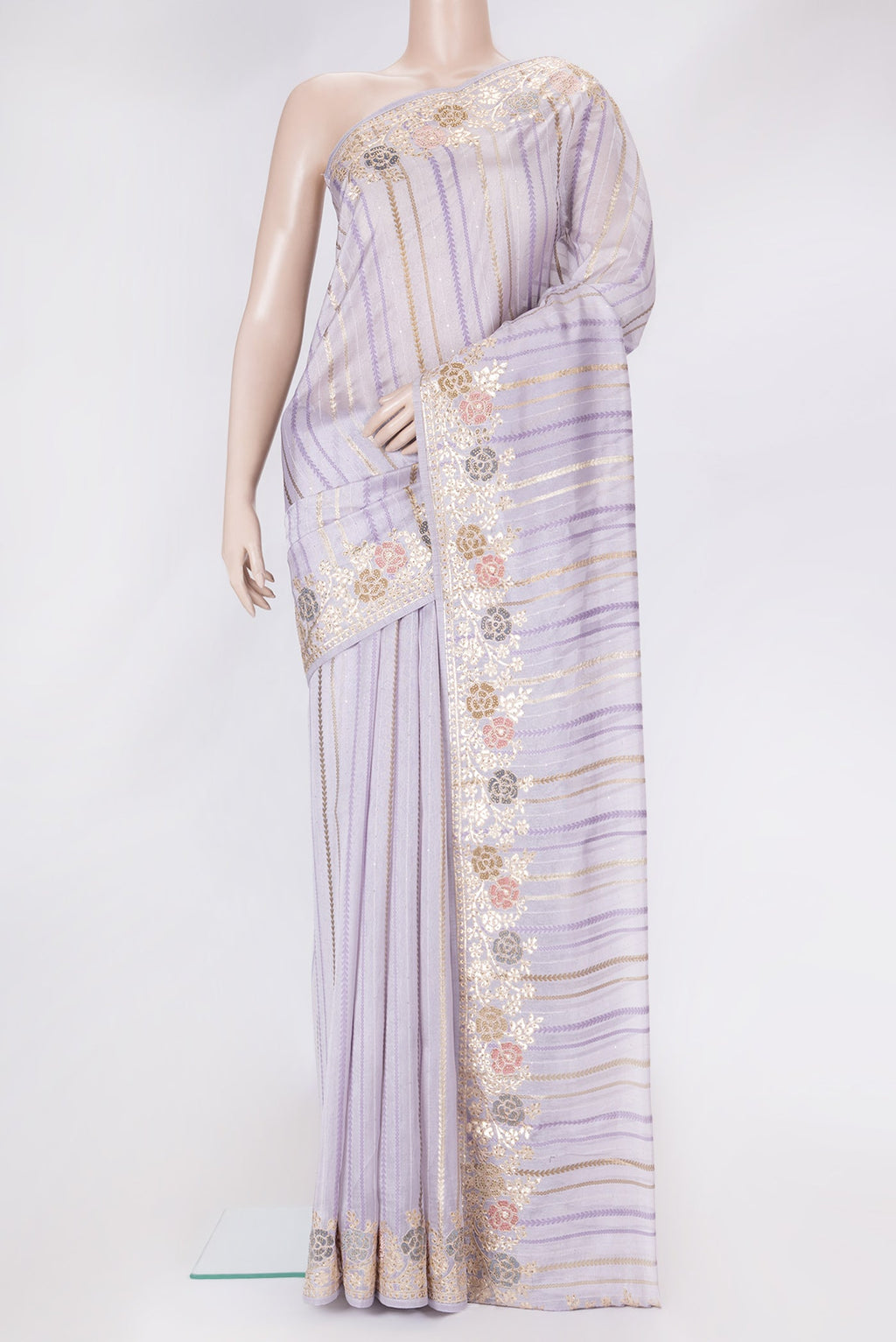 Lavender Dual Tone Organza Silk Saree with Stripes on the body and Fancy Border.  displayed on a mannequin