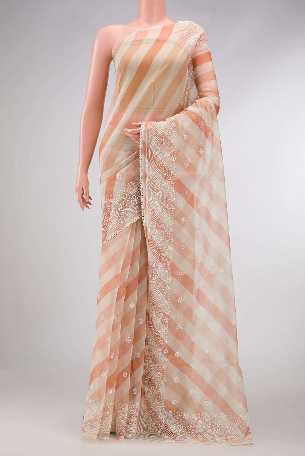 Beige and Maroon Color Organza Silk Saree with Embroidery on the body and Embroidery Border.  displayed on a mannequin