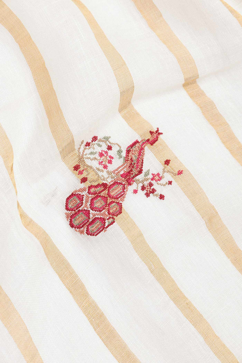 Close up of Beige Dual Tone Linen Saree with Embroidery on the body and Embroidery Border displaying folds