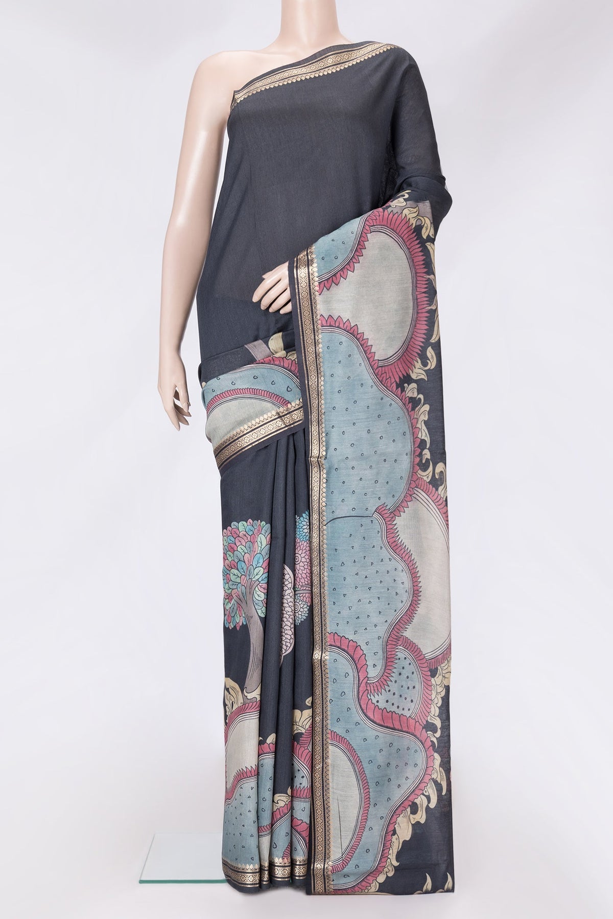 Black Dual Tone Tussar Silk Saree with Printed design on the body and Zari Border.  displayed on a mannequin