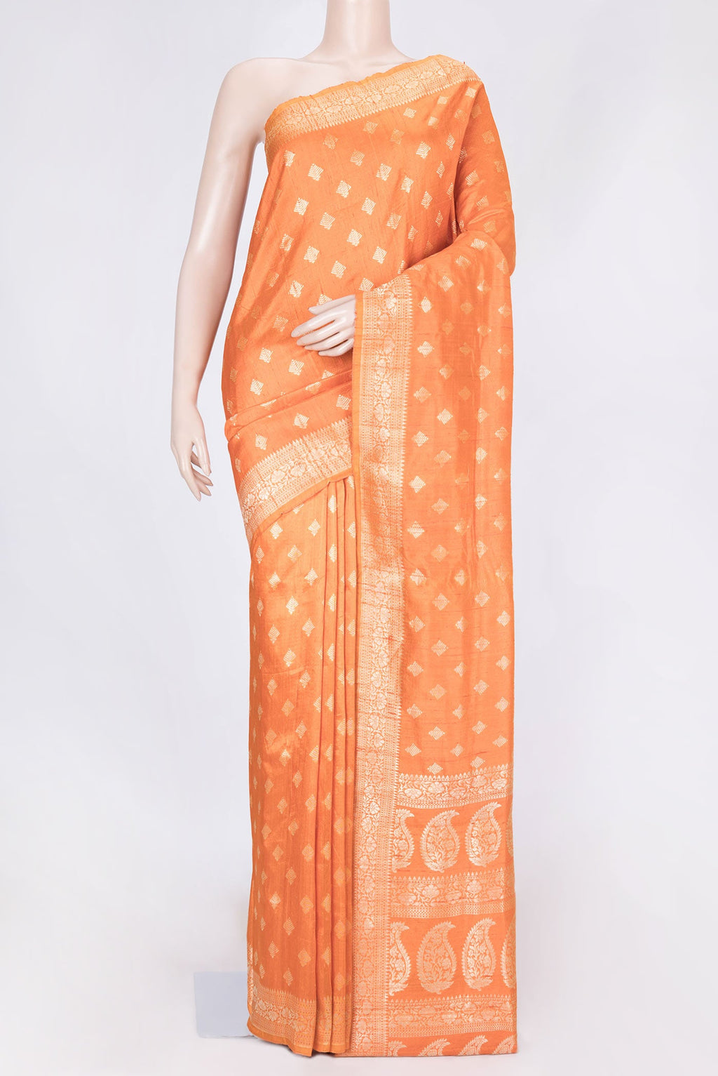 Orange Dual Tone Raw Silk Saree with Zari Brocade on the body and Zari Border displayed on a mannequin