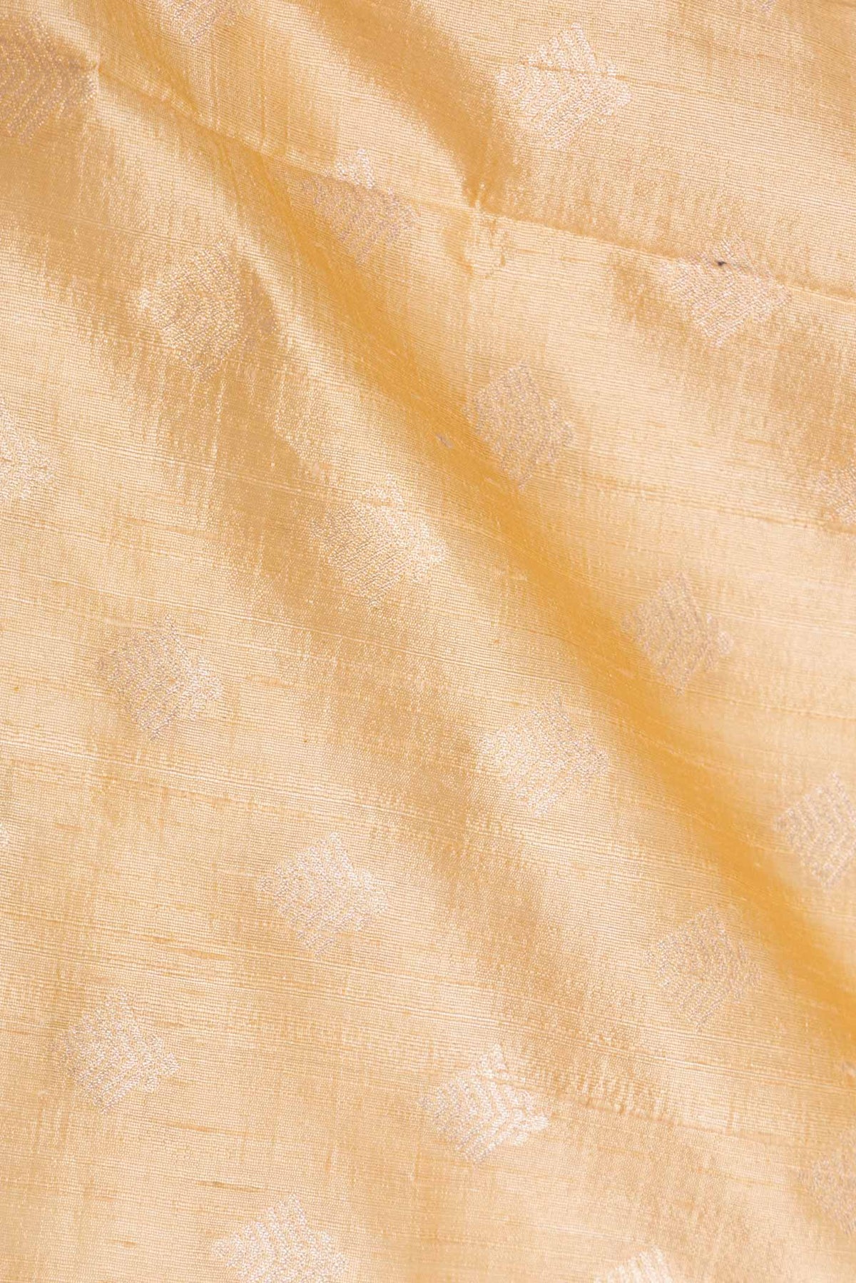 Close up of Sandal Dual Tone Raw Silk Saree with Zari Brocade on the body and Zari Border displaying folds