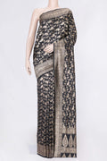 Black Dual Tone Raw Silk Saree with Zari Brocade on the body and Zari Border displayed on a mannequin