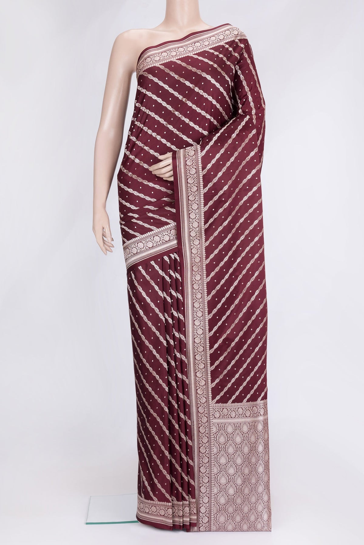 Maroon Dual Tone Blended Banarasi Silk Saree with Zari Brocade on the body and Zari Border.  displayed on a mannequin