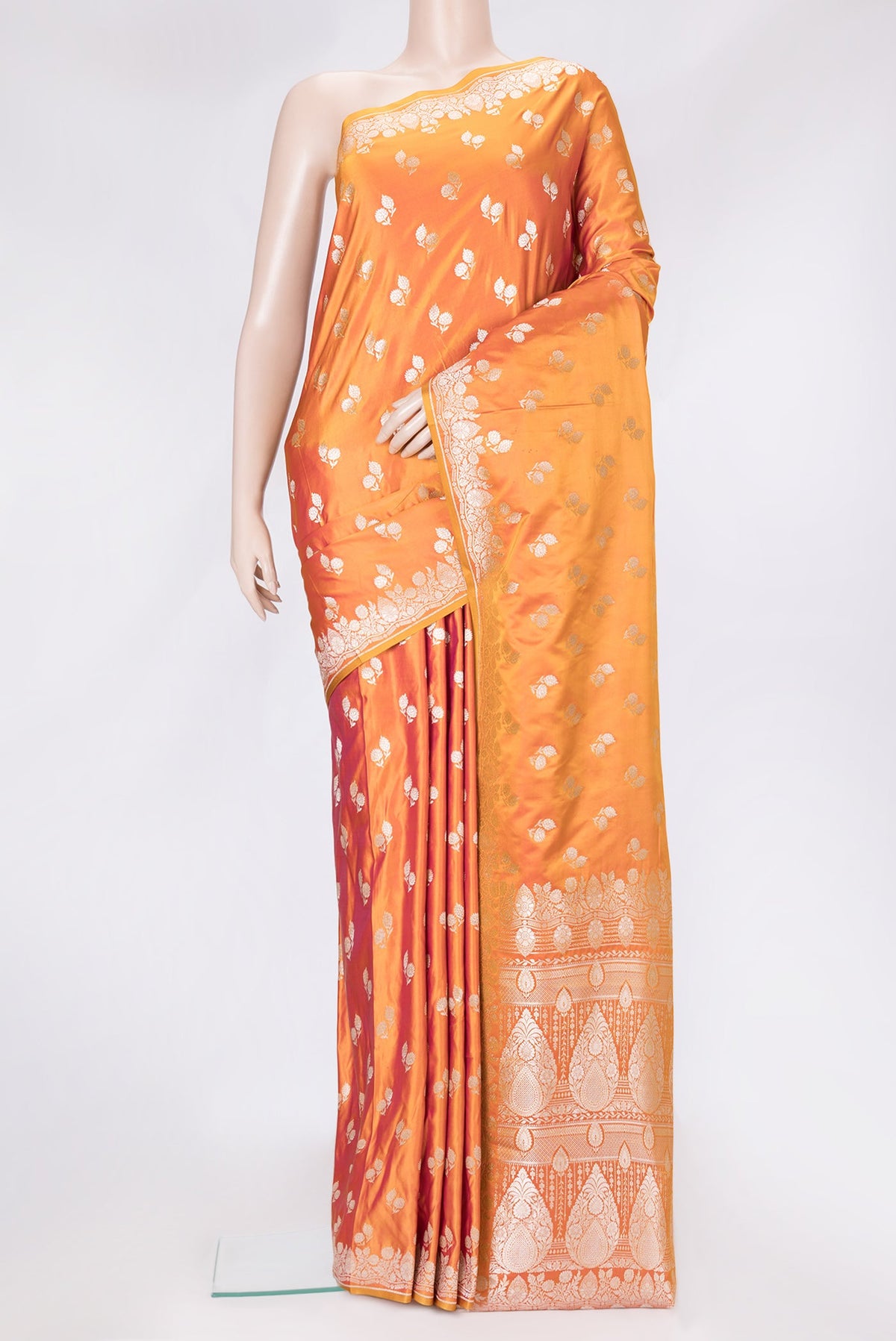 Coral Dual Tone Banarasi Silk Saree with Zari Butta on the body and Fancy Border.  displayed on a mannequin