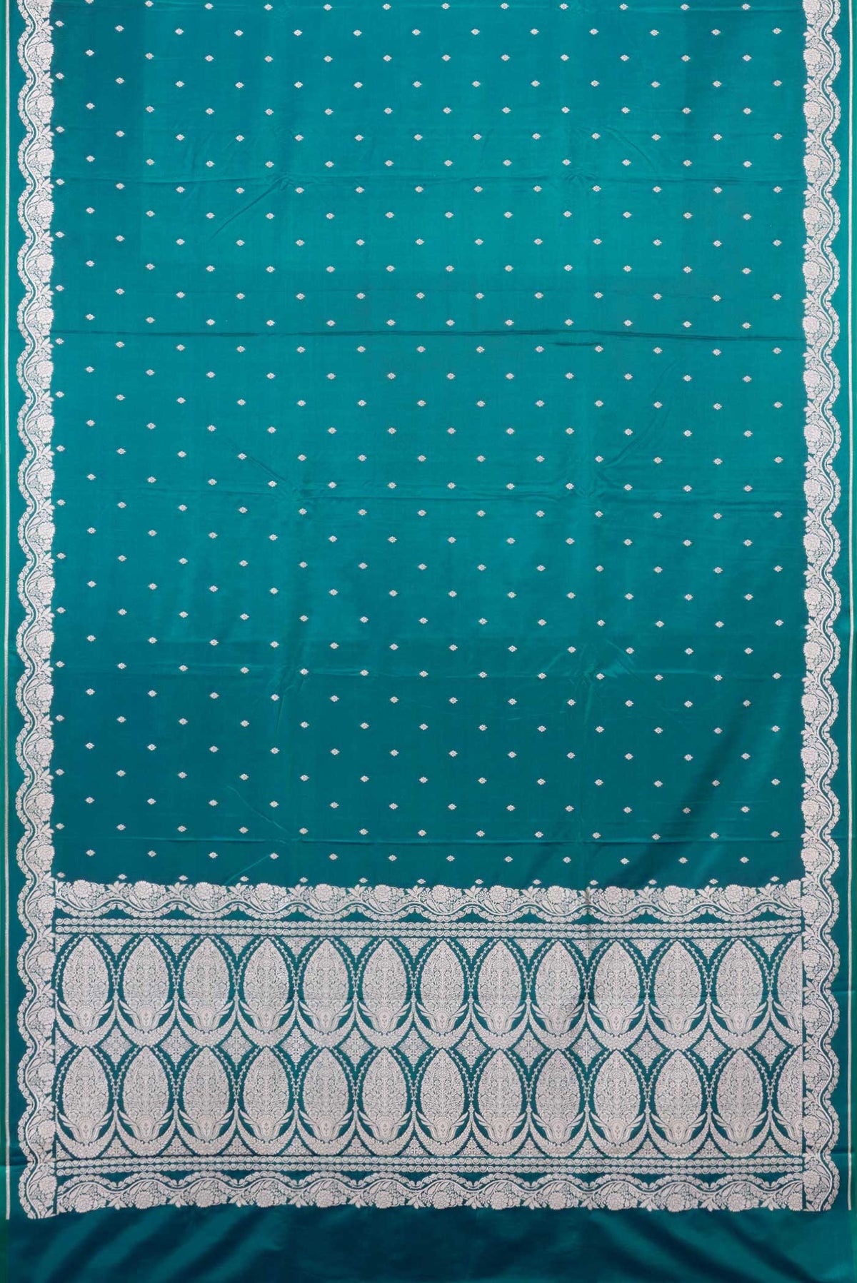 Flat view of Peacock Blue Dual Tone Blended Banarasi Saree with Zari Butta on the body and Zari Border. 