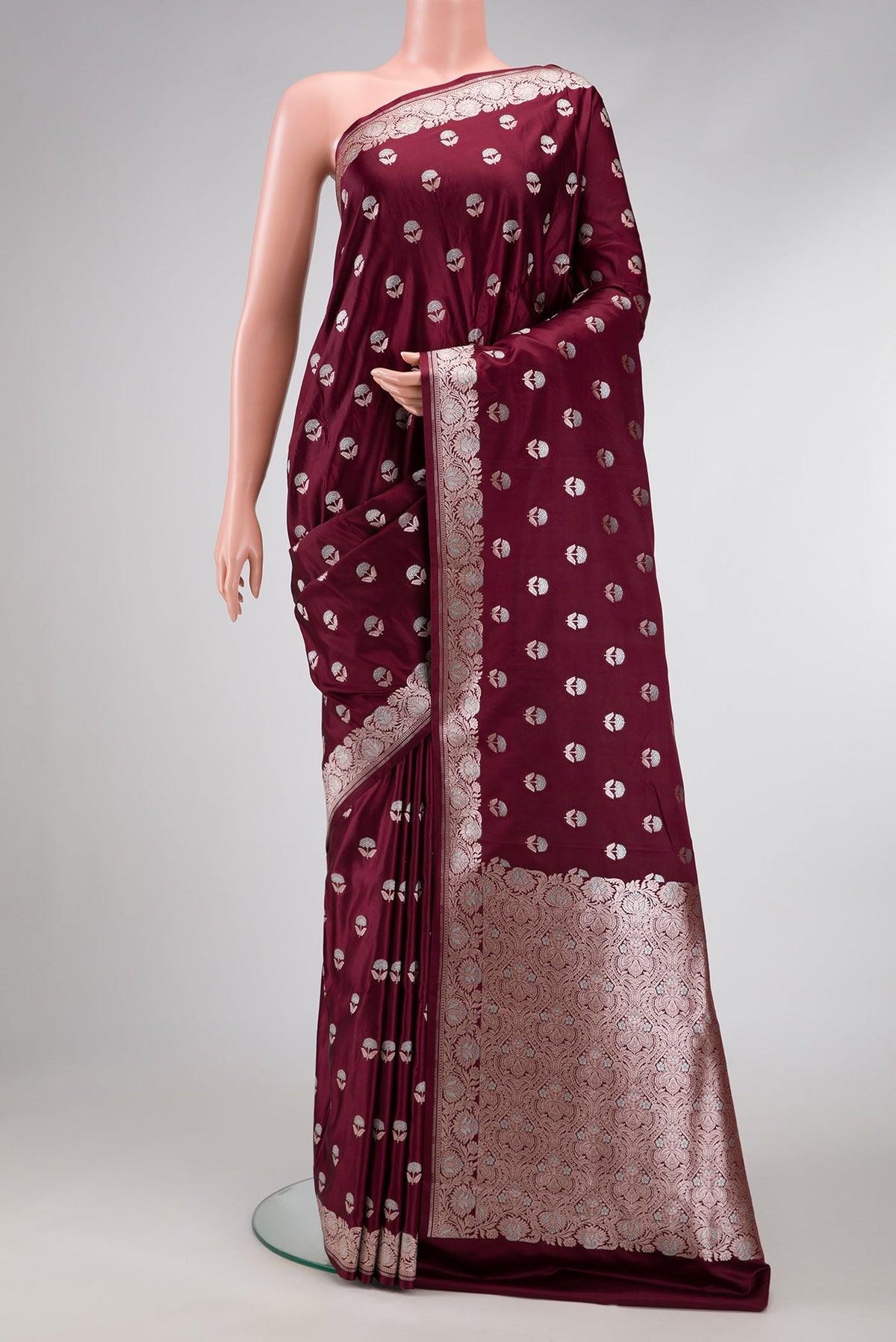 Coffee Brown Dual Tone Blended Banarasi Silk Saree with Zari Butta on the body and Zari Border.  displayed on a mannequin