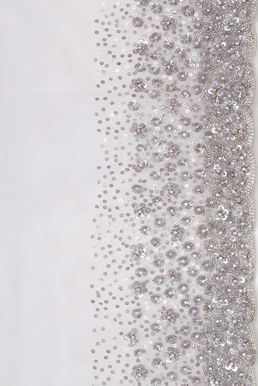 Border image of Grey Dual Tone Organza Silk Saree with Plain Body and Embroidery Border. 