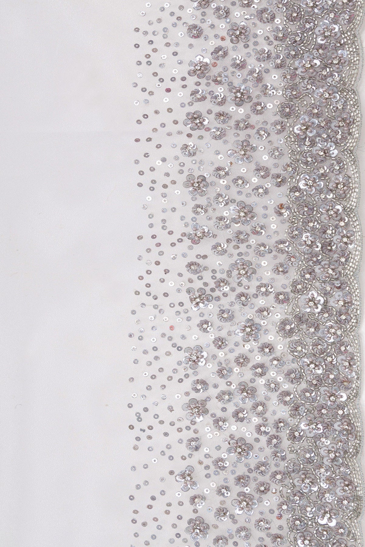 Border image of Grey Dual Tone Organza Silk Saree with Plain Body and Embroidery Border. 