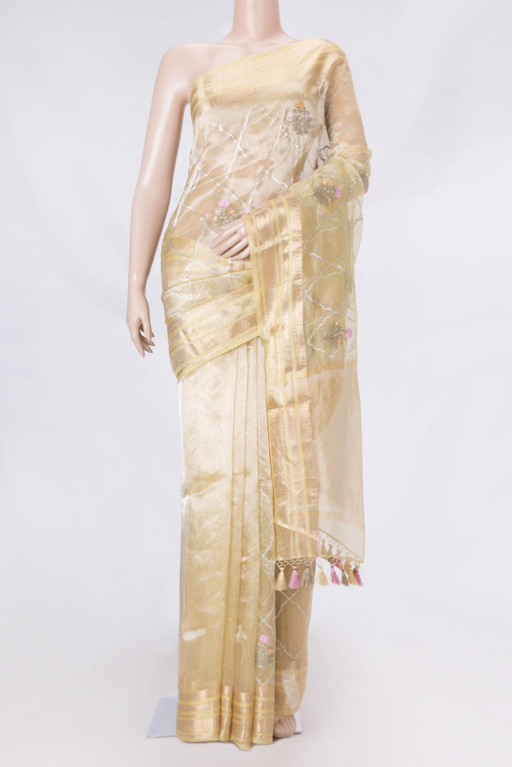 Gold Dual Tone Organza Silk Saree with Zari And Thread Butta on the body and Zari Border displayed on a mannequin