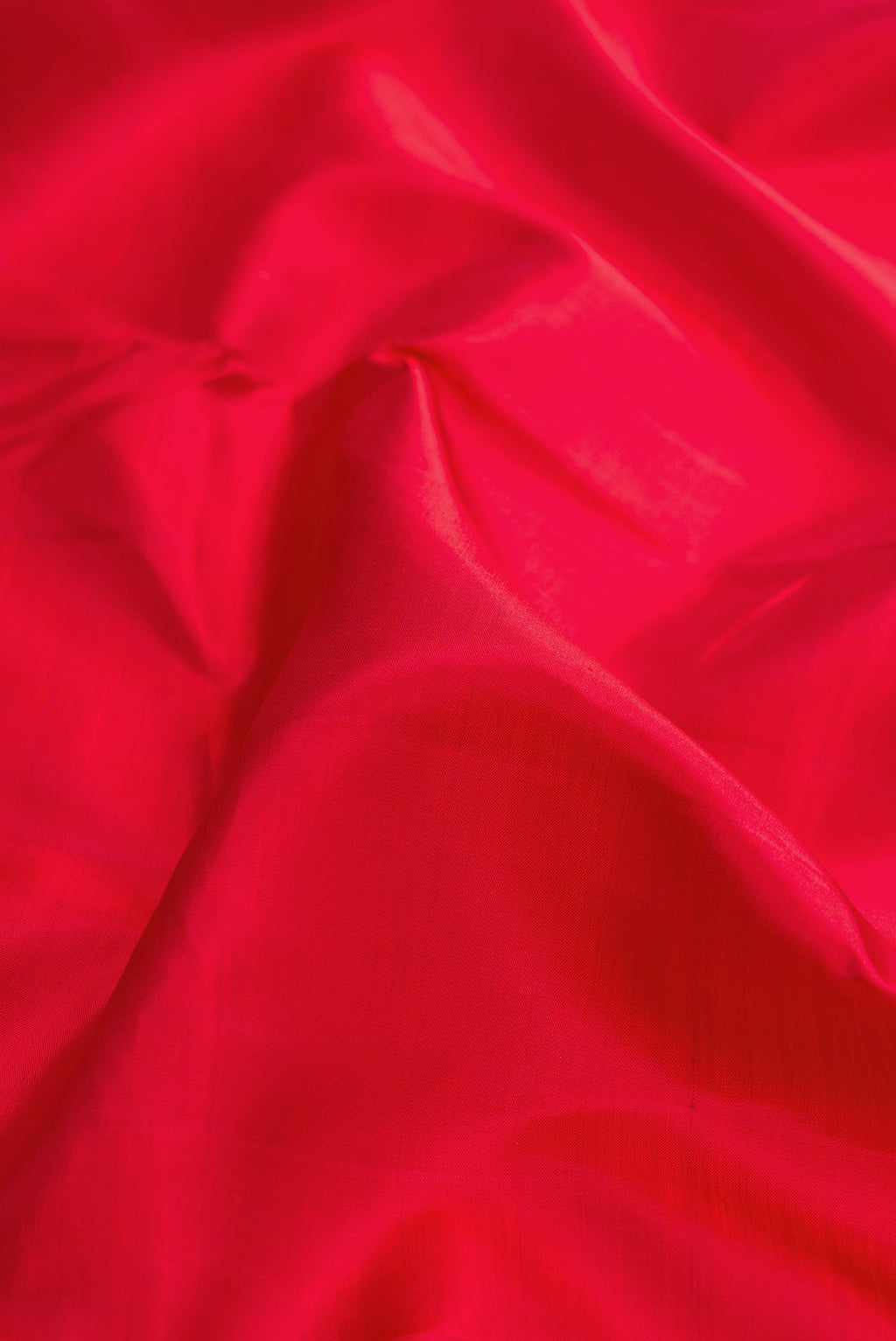 Close up of Pure Silk Pure Zari Red Dual Tone Kanjivaram Nine Yards Saree with Plain Body and Zari Border.  displaying folds