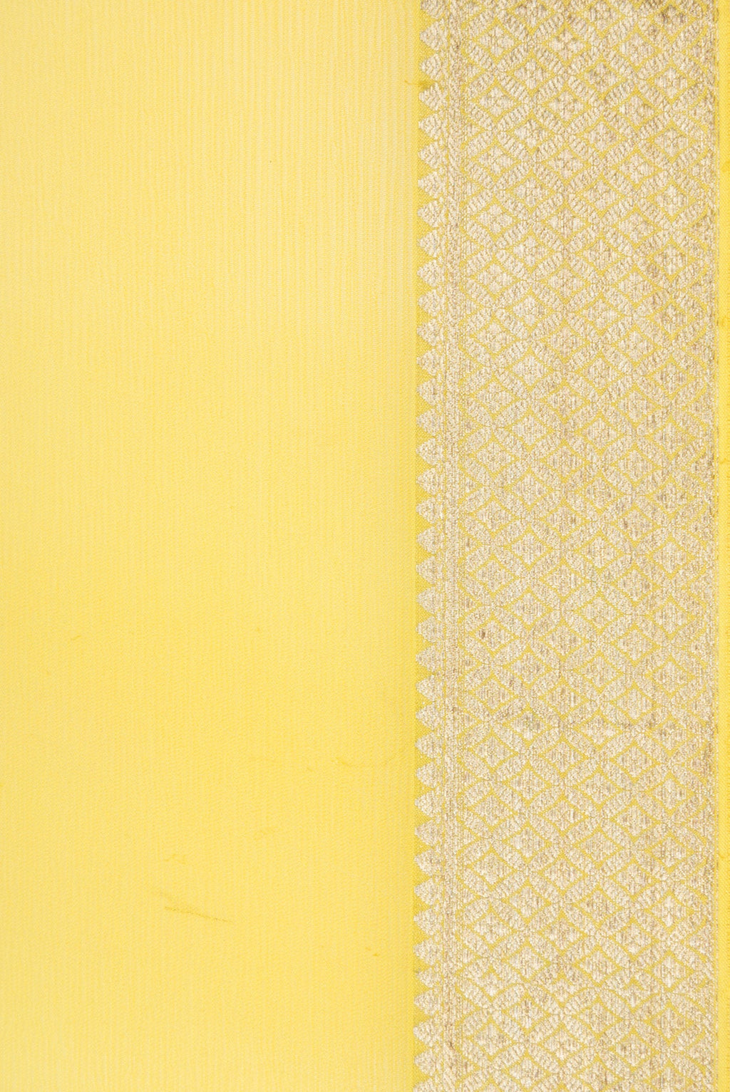 Border image of Lemon Yellow Dual Tone Mysore Chiffon Saree with Plain Body and Zari Border. 