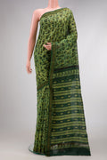 Green Dual Tone Tussar Silk Saree with Printed design on the body and Zari Border.  displayed on a mannequin