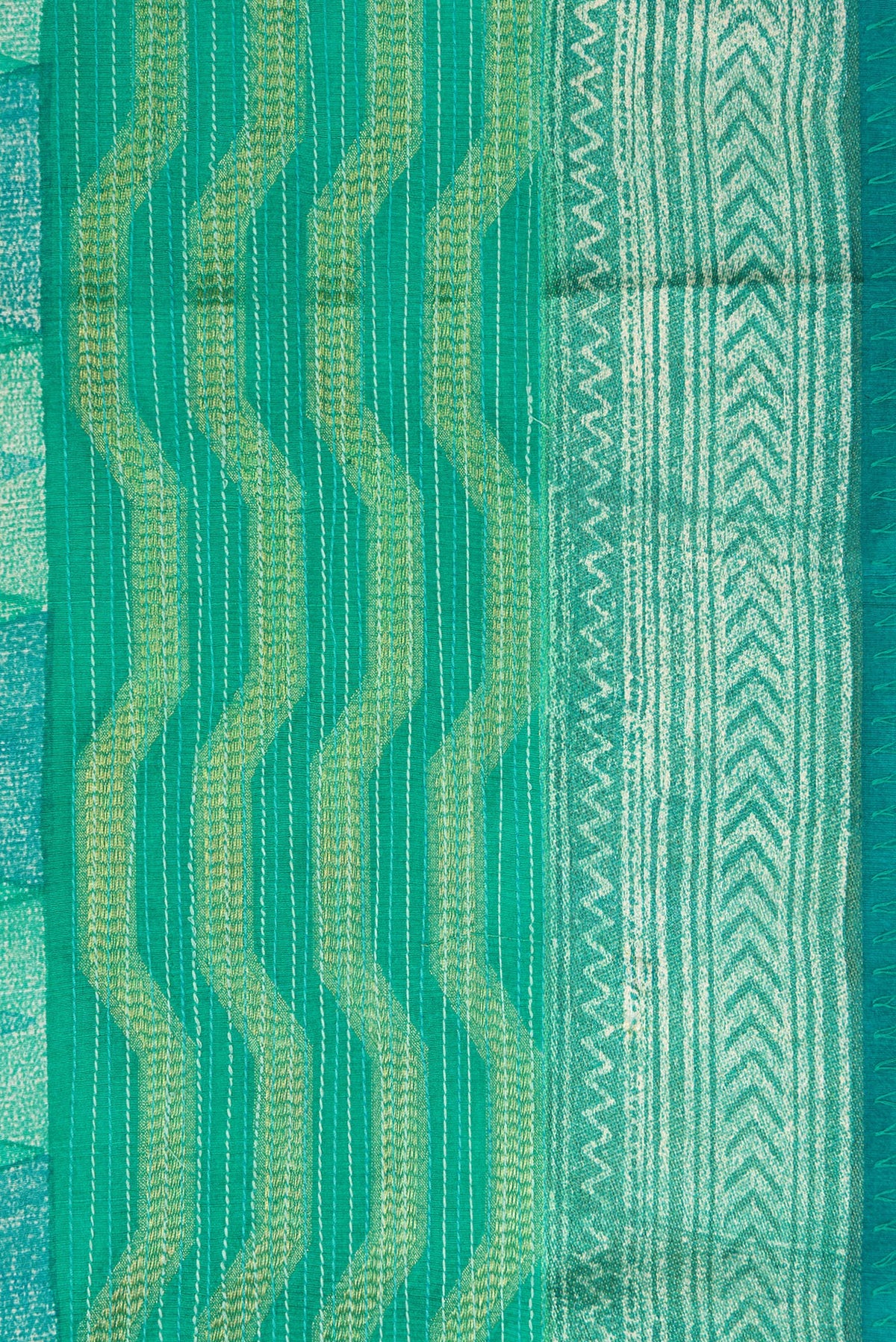 Border image of Sea Green Dual Tone Tussar Silk Saree with Printed design on the body and Zari Border. 