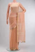 Peach Raw Silk Saree Checked design on the body and Zari Border displayed on a mannequin
