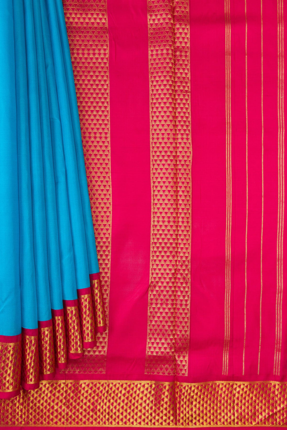 Pleats and pallu of Sky Blue Dual Tone Kanjivaram Silk Nine Yards Saree with Plain Body and Zari Border. 