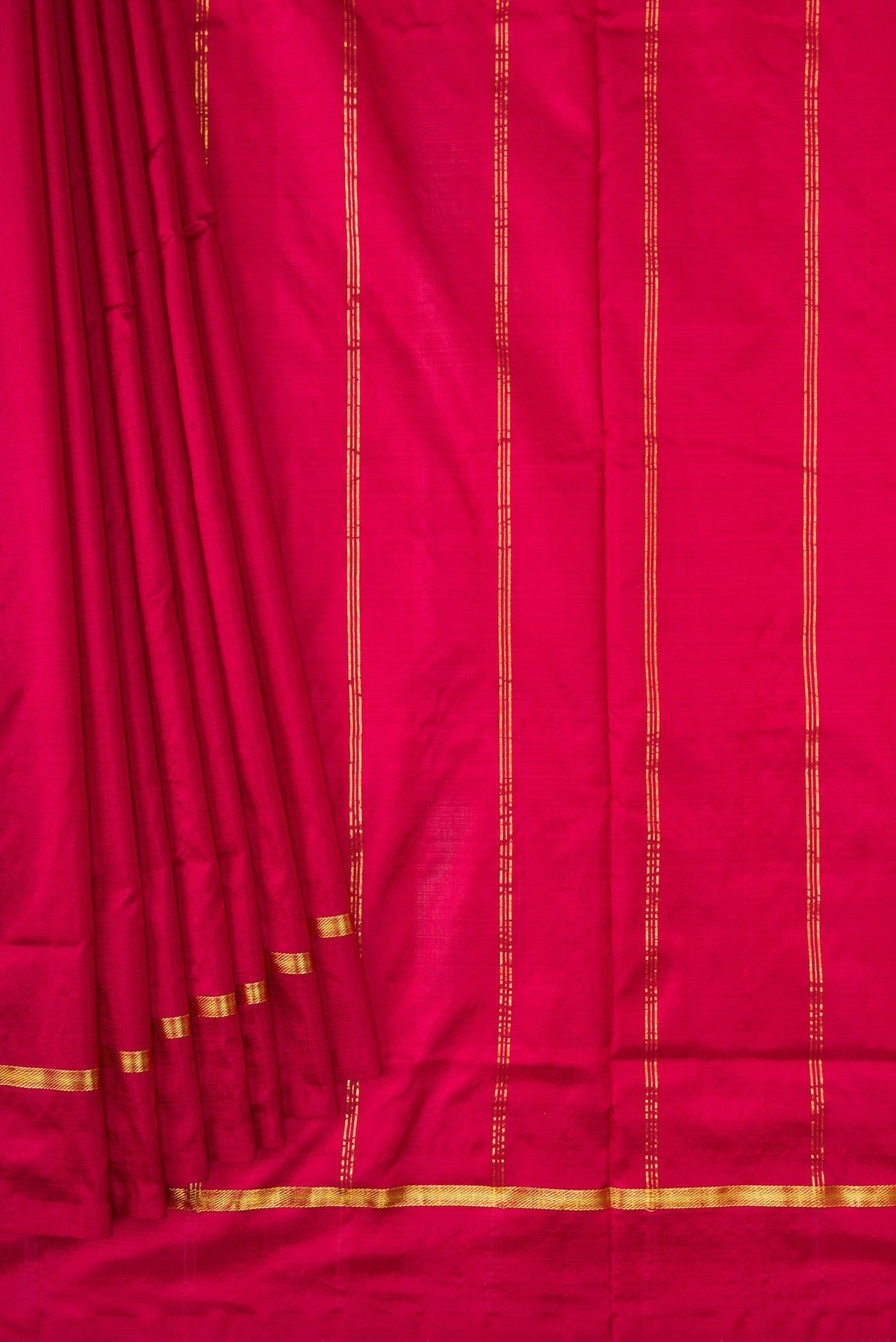 Pleats and pallu of Maroon Dual Tone Kanchipuram Silk Nine Yards Saree with Plain Body and Zari Border. 