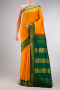 Pure Silk Pure Zari Yellow Dual Tone Kanchipuram Nine Yards Saree with Plain Body and Zari Border.  displayed on a mannequin