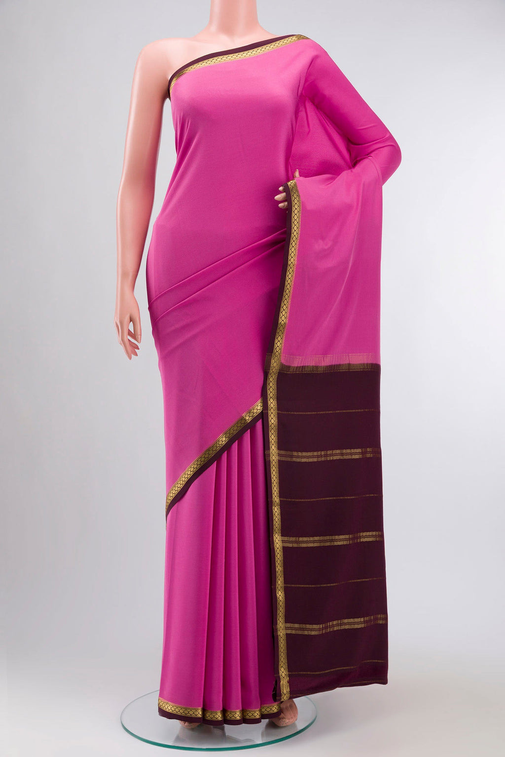 Pure Silk Pure Zari Pink Mysore Crepe Saree with Plain Body and Zari Border displayed on a mannequin