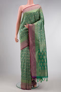 Green Dual Tone Blended Banarasi Silk Saree with Zari Brocade on the body and Zari Border.  displayed on a mannequin