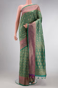 Sea Green Dual Tone Blended Banarasi Silk Saree with Zari Brocade on the body and Zari Border.  displayed on a mannequin