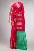 Dark Pink Dual Tone Kanchipuram Silk Saree with Zari Butta on the body and Fancy Border displayed on a mannequin
