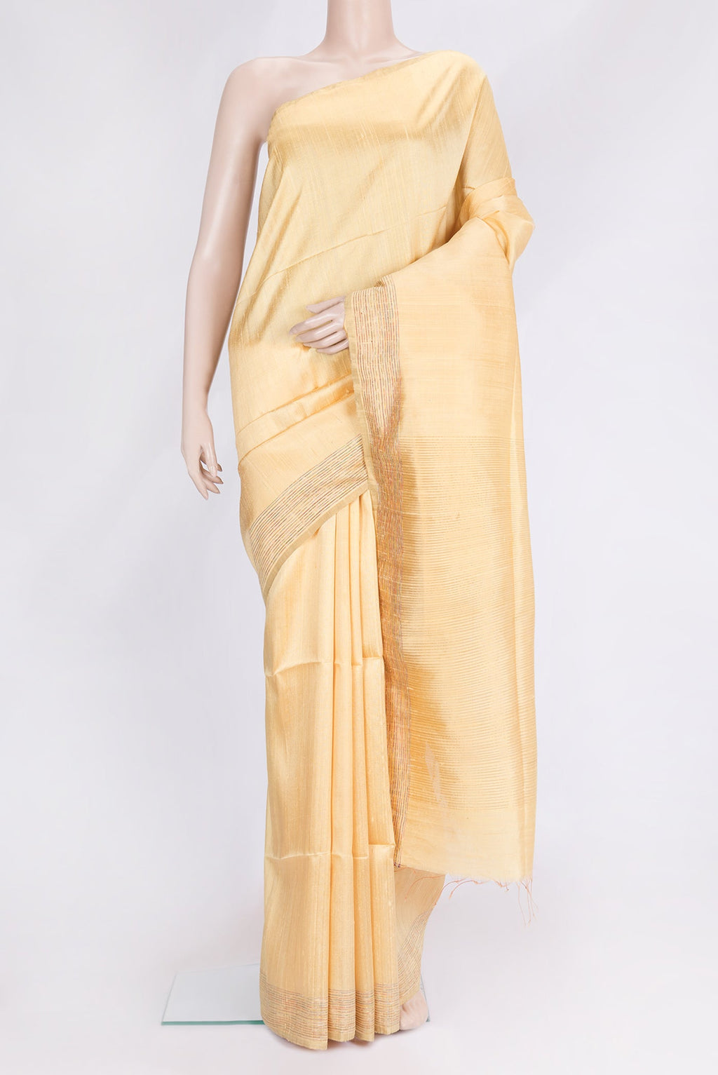 Sandal Dual Tone Raw Silk Saree with Plain Body and Zari And Thread Border.  displayed on a mannequin