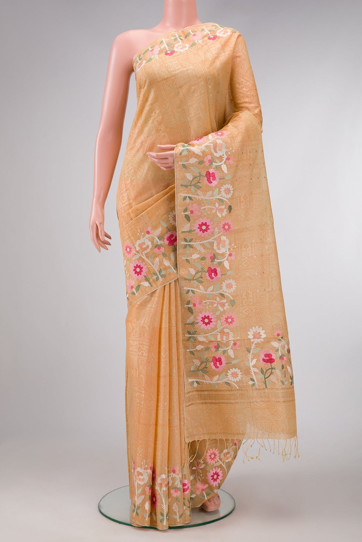Beige Dual Tone Organza Silk Saree with Printed design on the body and Embroidery Border.  displayed on a mannequin