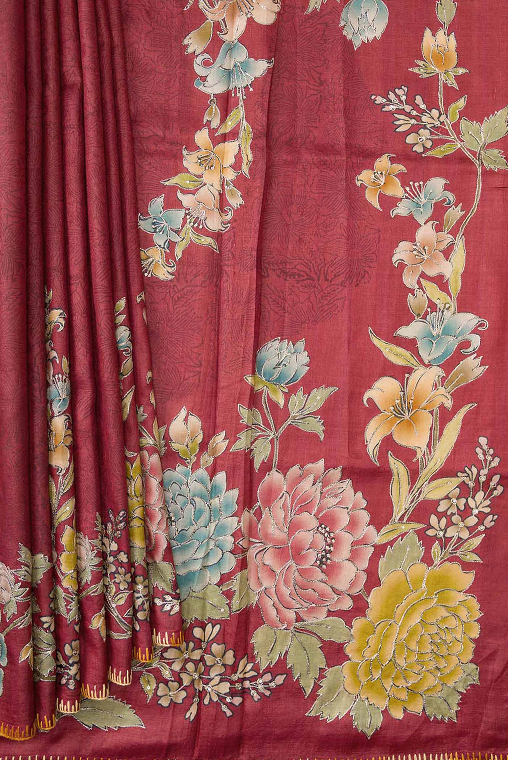 Pleats and pallu of Maroon Tussar Silk Saree with Floral Print on the body and Embroidery Border