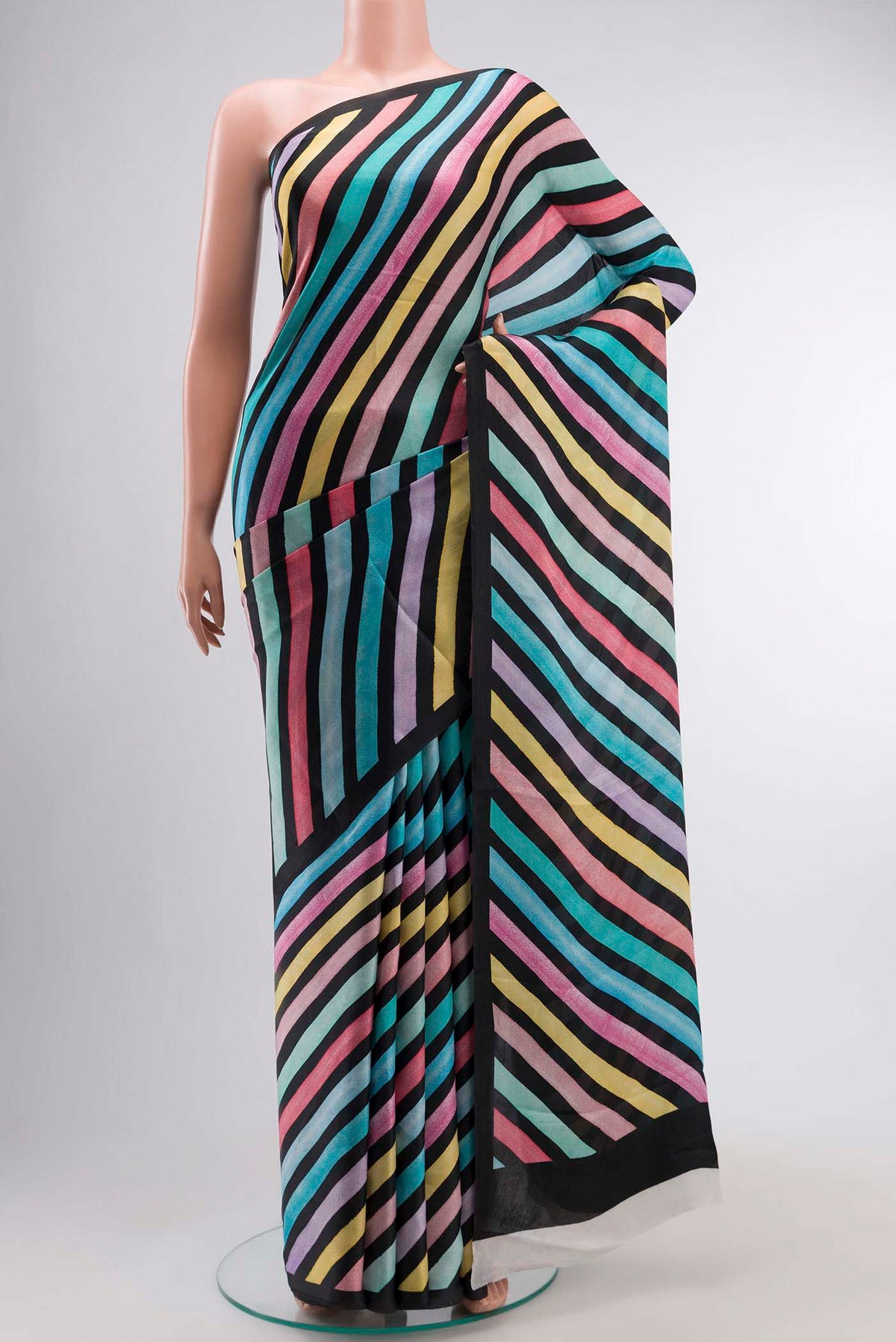 Multi Color Satin Crepe Saree with Printed design on the body and Plain Border displayed on a mannequin