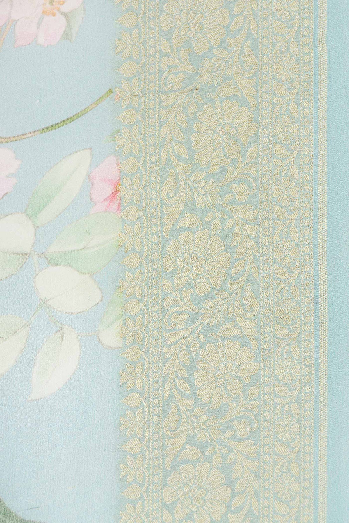 Border image of Light Blue Dual Tone Mysore Georgette Saree with Printed design on the body and Zari Border