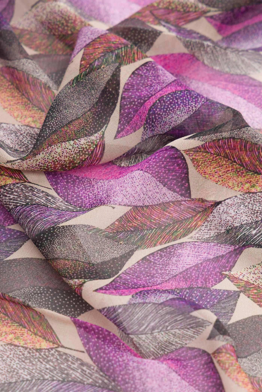 Close up of Lavender Dual Tone Mysore Georgette Saree with Printed design on the body and Plain Border displaying folds