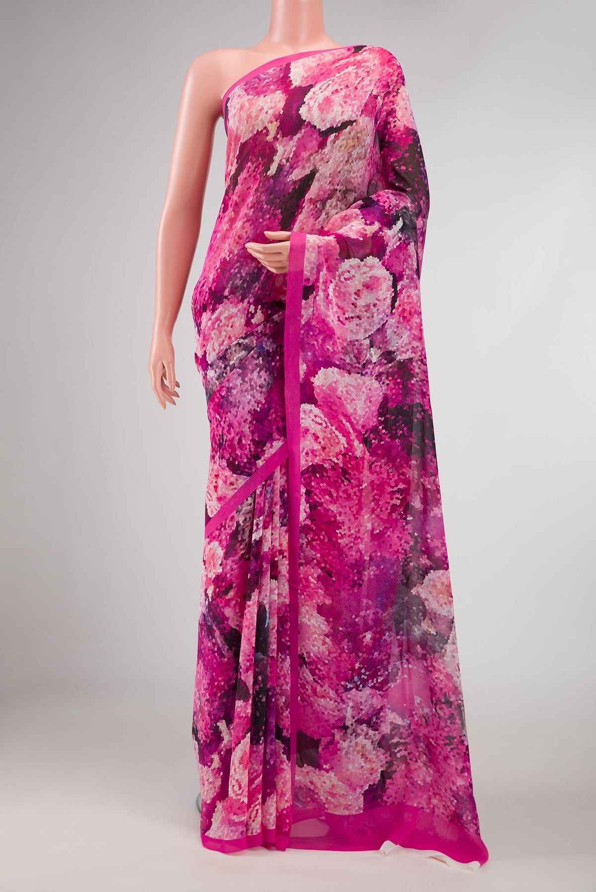 Pink Dual Tone Mysore Georgette Saree with Printed design on the body and Plain Border displayed on a mannequin