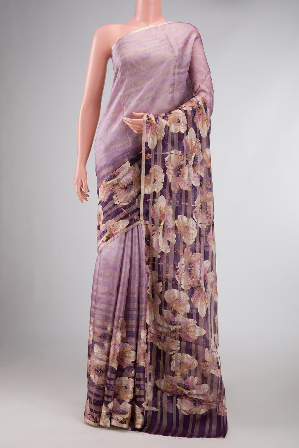 Lavender Dual Tone Mysore Georgette Saree with Printed design on the body and Zari Border displayed on a mannequin