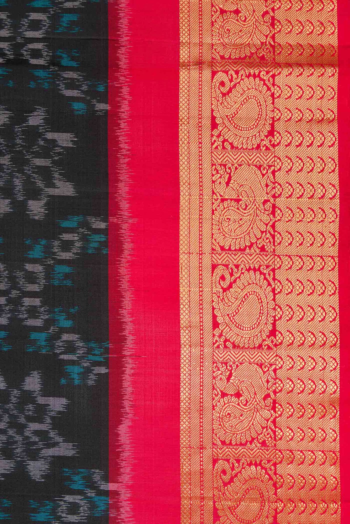 Border image of Black Dual Tone Soft Silk Saree with Ikat Print on the body and Zari Border. 