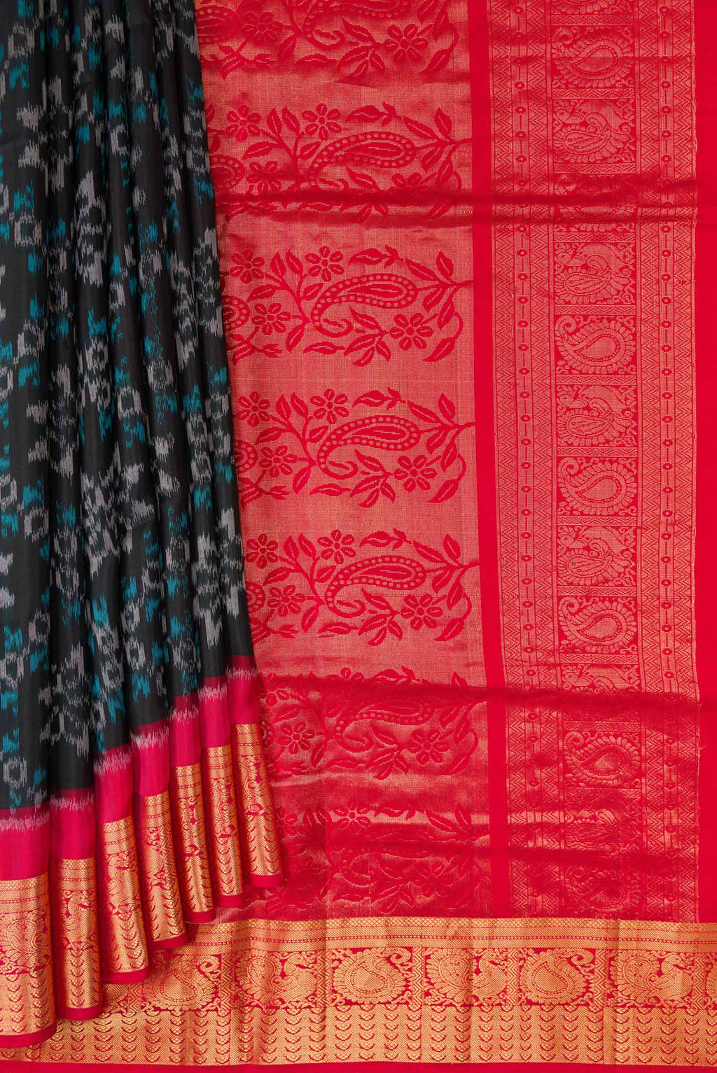 Pleats and pallu of Black Dual Tone Soft Silk Saree with Ikat Print on the body and Zari Border. 