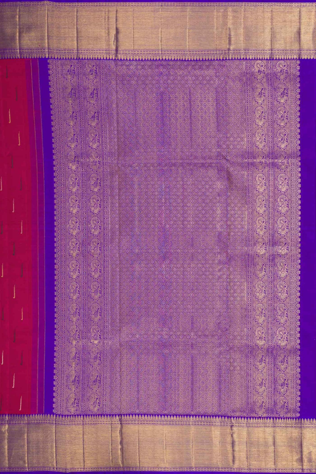 Close up image of the pallu of Magenta Dual Tone Kanchipuram Silk Saree with Zari And Thread Butta on the body and Zari Border. 