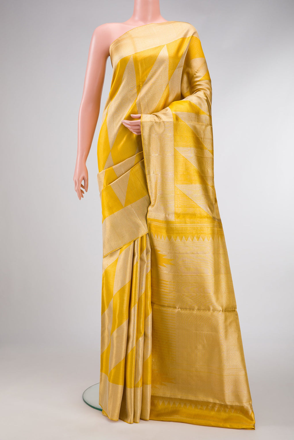 Gold Dual Tone Tissue Silk Saree with Zari Brocade on the body and Zari Border.  displayed on a mannequin