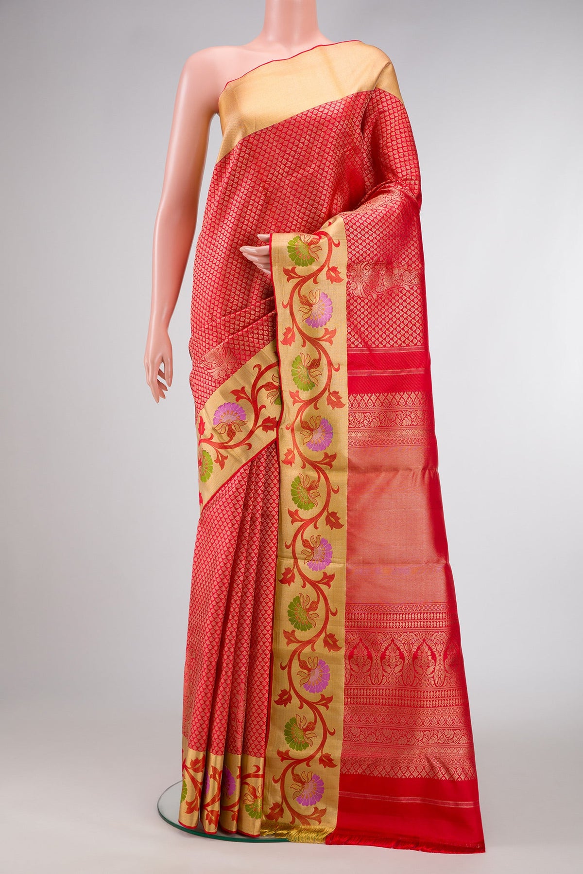 Red Dual Tone Kanjivaram Silk Saree with Zari Brocade on the body and Fancy Border.  displayed on a mannequin